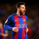 Messi magic sends Barca top again