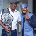 MMA world champ presents? ? belt to Togbe Afede XIV