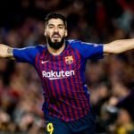 Suarez strikes double, but Barca suffer title blow