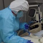 WHO: Record rise in weekly COVID-19 cases, but deaths down