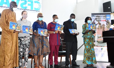 • Dr Faustina Frempong-Ainguah (left) and other development partners launching the report Photo: Seth Osabukle