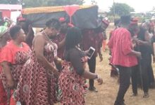 • The remains of Ama Benyiwa Doe carried for burial