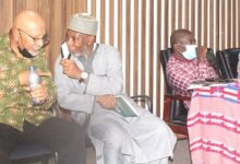 • .Dr Mohamed-Sani Abdulai (second from left) interacting with Mr Anis Haffar after the lecture. Photo: Ebo Gorman