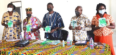 • Dr Mensah-Abrampa (second from right) Mr Kpankpah (middle) with other dignitries with the handbook. Photo: Vincent Dzatse