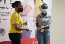 • Dr Agyeman-Rawlings (left) presenting a certificate to one of the beneficiaries of the training