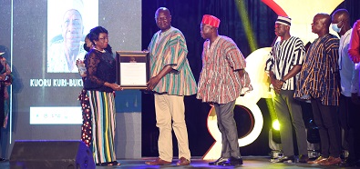 • A rep of Kuoru Kuri-Buktie Limann (second from left) receiving his award Photo: Geoffrey Buta