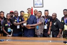 • Mr Mustapha Ussif with players and officials of the Black Challenge. On the extreme left is Sampson Deen.
