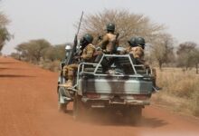 Soldiers from Burkina Faso and Niger patrol on the road of Gorgadji in the Sahel area