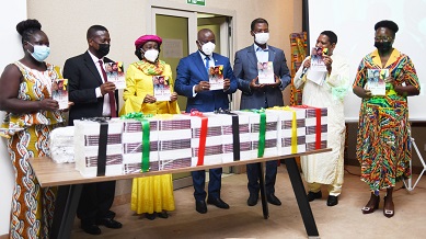 • Mrs. Konadu Agyemang Rawlings (second from left) and Mr. Dominic Ntiwul (fourth from right) with other dignetaries launching the book Photo: Geoffrey Buta