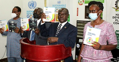 • Prof. Gyan Baffour (second from right),Dr Kodjo Mensah-Abrampa(second from left) and other dignitaries launching the 2020 SDGs and AU agenda 2063 reports. Photo. Ebo Gorman