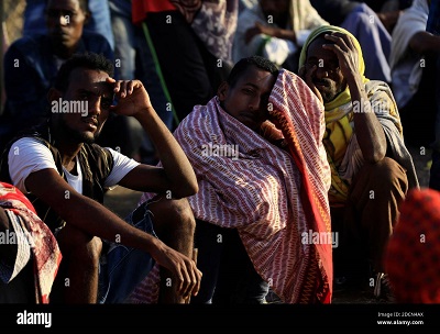 Ethiopians who fled the ongoing fighting in Tigray region, gather in Hamdaye village near the Sudan-Ethiopia border