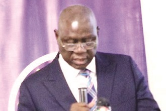 Chief Justice Anin Yeboah (inset) speaking at the event