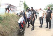 • ASP Baffour-Awuah(with shovel)and other personnel distiling a gutter Photo Anita Nyarko-Yirenkyi