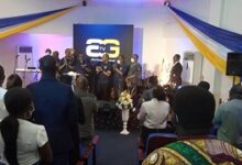 Rev. Paul Frimpong – Manso hand raised as he launches the Television Station