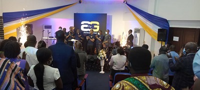 Rev. Paul Frimpong – Manso hand raised as he launches the Television Station