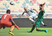Sierra Leone's goalie Kamara(man of the match) about to make a save in their game against Algeria yesterday
