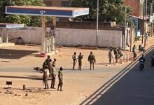 Soldiers stand outside a military base in Burkina Faso’s capital Ouagadougou