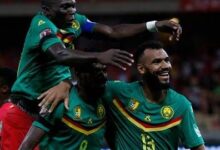 • Cameroon players celebrating a goal against Burkina Faso