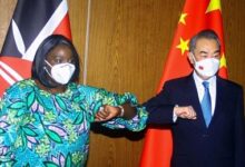 • Mr Wang Yi and Madam Raychelle Omamo bump elbows during a news conference in Mombasa, Kenya.jpg