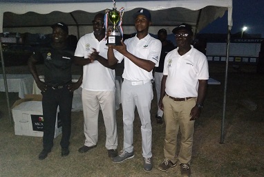 Torgah, second from (left) displaying his trophy after Saturday's victory