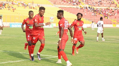 Etouga (second from right) being joined by his colleagues to celebrate one of his goals on the afternoon