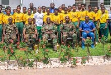 • Maj Gen Oppong Peprah (middle, seated) and other senior officers with members of the table tennis team