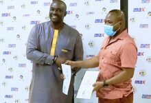 • Mr Kotei Neequaye (left) and Mr Maxwell Techie with the signed contracts