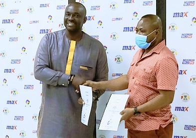 • Mr Kotei Neequaye (left) and Mr Maxwell Techie with the signed contracts