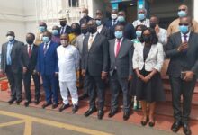 Chief Justice, Kwasi Anin Yeboah(fifth from right) with the newly sworn-in NMC members