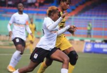 Ghana's Susan Ama Duah challenges Harima Kanyaga for the ball during the game