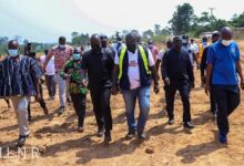 Mr Jinapor (fourth from right) and other officials inspecting the project site