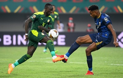 Senegal forward Sadio Mane (L) is challenged by Cape Verde defender Steven Fortes during the game