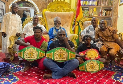• Sheikh Sharubutu with the three champions and officials