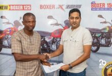 Mr Ntiamoah-Boakye (right) exchanges the MoU with Mr. Sharma