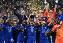 Chelsea players celebrate with the FIFA Club World Cup trophy