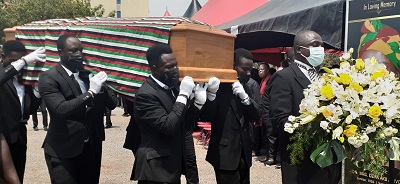 pall bearers conveying the casket away