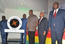 Dr Matthew Opoku Prempeh(middle) with Mr Egbert Faibille Jnr (right) and other dignitaries after unveiling and launching of GWB logo Photo Victor A. Buxton