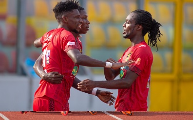 Etouga (left) is joined by Richmond Lamptey to celebrate the opener