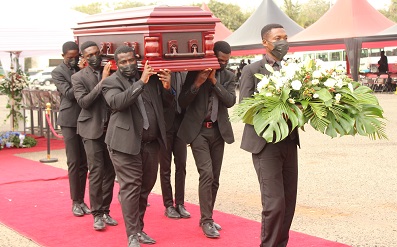 Pallbearers carrying the casket containing the remains of the late Mr Joseph Kofi Adda for burial. Photo. Ebo Gorman