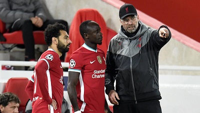 From left: Salah, Mane listening to their Liverpool coach
