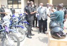 Mr Anthony Minkah(third from right) presenting the motorcycles to Dr George Akuffo Damapre