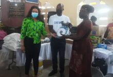 • Representatives of the NGO presenting the cheque to Mrs Quarshie-Kumasa