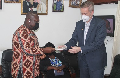 Mr Vigah(left) presenting a copy of the book to Mr. Brosnahan. Photo Godwin Ofosu-Acheampong