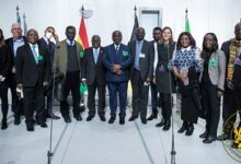President Akufo-Addo (sixth from left) with members of the Ghanaian National Vaccine Institute