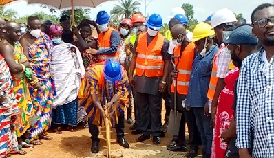 Rev Dr John Ntim Fordjour cutting the sod for the construction works to begin