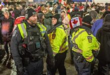 Canadian police in an altercation with tucker rally protesters (2)