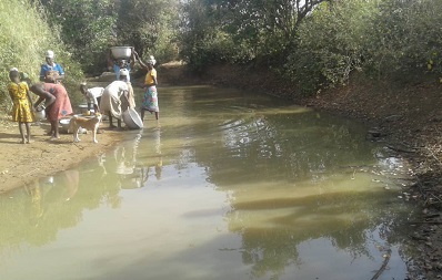 Some women at Ninonteng fetching water from the stream