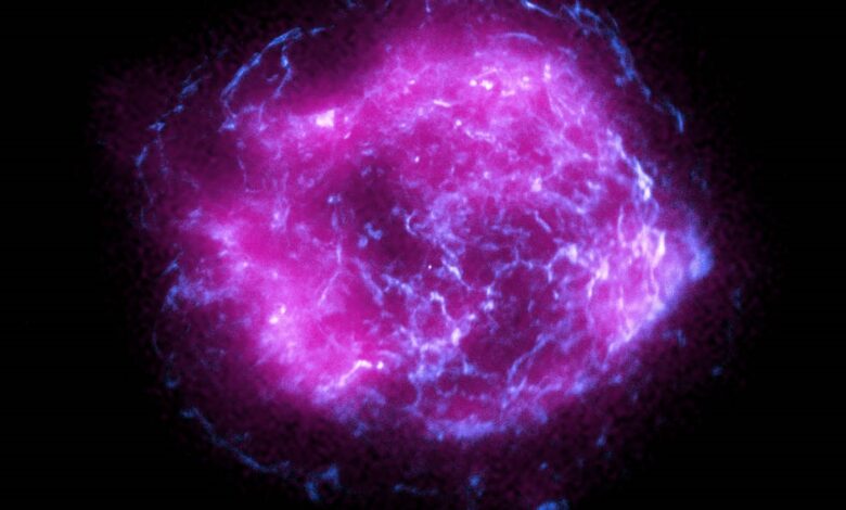 This image of the supernova Cassiopeia A combines some of the first X-ray data collected by NASA’s Imaging X-ray Polarimetry Explorer, shown in magenta, with high-energy X-ray data from NASA’s Chandra X-Ray Observatory, in blue. Credits: NASA/CXC/SAO/IXPE