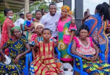 • Bernard Tekpetey together with some widows after the donation