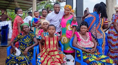 • Bernard Tekpetey together with some widows after the donation